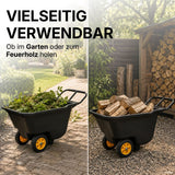 Prakta S beladen mit Grünschnitt und mit Brennholz vor Holzlager